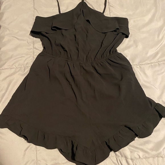 Chic Black Ruffle Romper - Picture 1 of 4